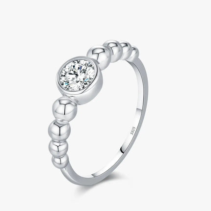 0.5Ct Moissanite Rings 925 Sterling Silver featuring a round moissanite stone in a stylish bezel setting.