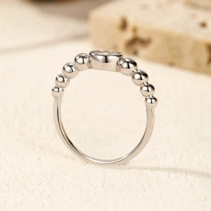 0.5Ct Moissanite Rings 925 Sterling Silver showing smooth bezel and bead detailing in sterling silver.