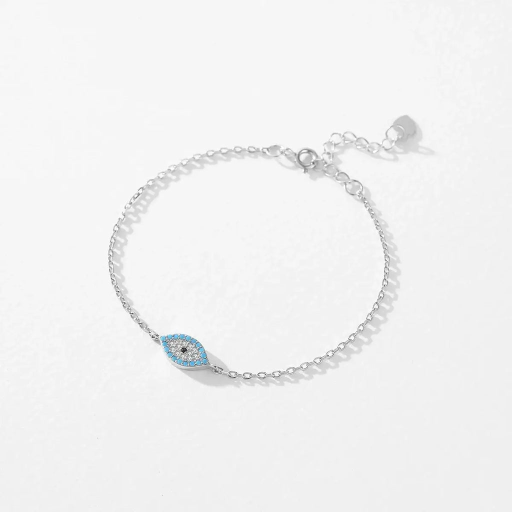 Bracelet 925 Sterling Silver with blue eye design and turquoise accents, adjustable and hypoallergenic.
