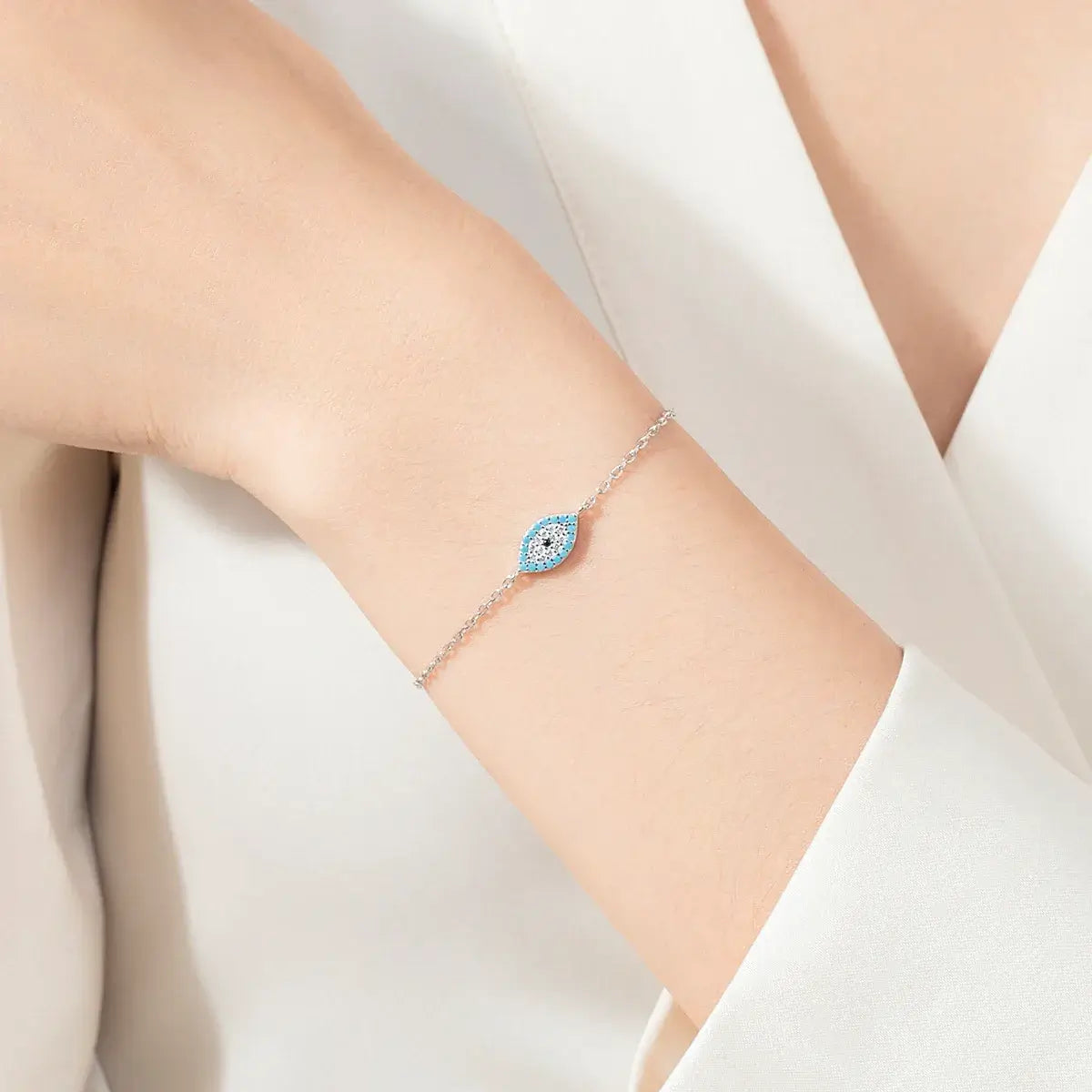 Elegant Bracelet 925 Sterling Silver with a blue eye design and turquoise stone accents.
