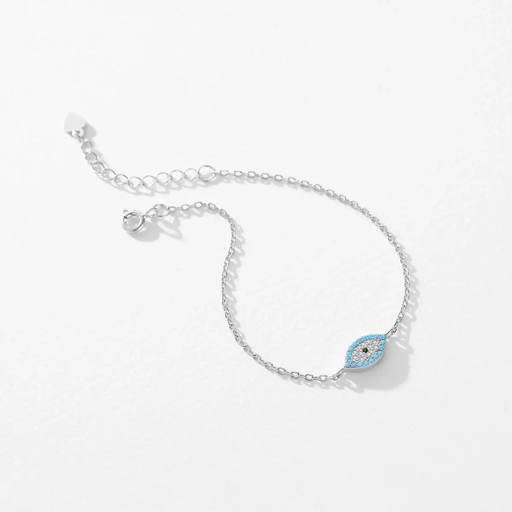 Bracelet 925 Sterling Silver with blue eye design and turquoise stone accents, adjustable fit.