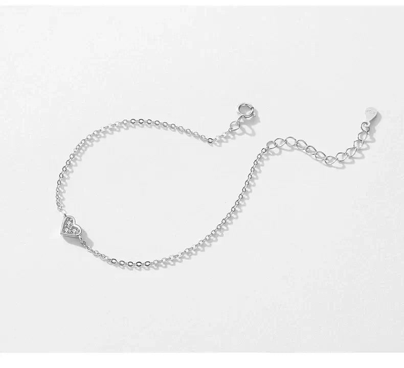 Bracelet 925 sterling silver with heart-shaped zircon accent, adjustable fit in gift box.