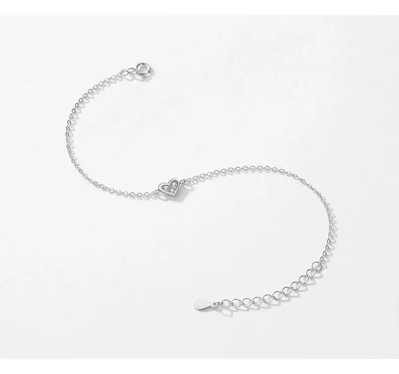 Bracelet 925 sterling silver featuring a heart-shaped zircon accent and adjustable chain for a perfect fit.