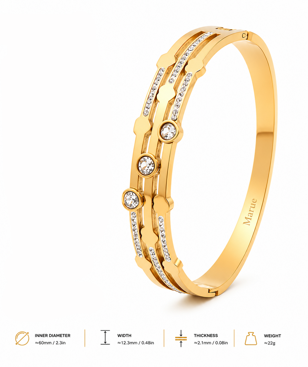 Golden bracelet with hearts and crystals