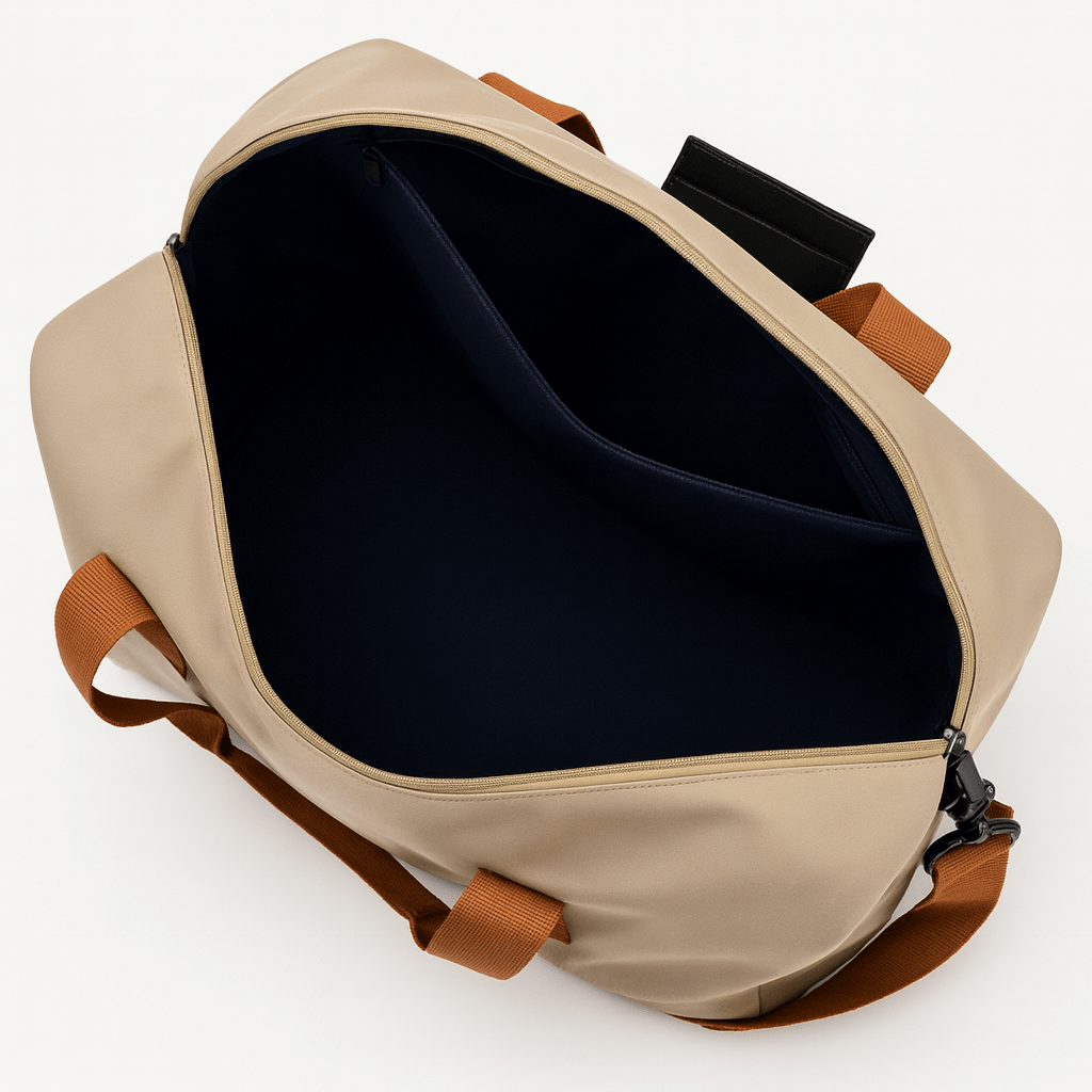 Interior view of a Gym Bag with Shoe Compartment, featuring ample storage space and a soft, flexible structure.