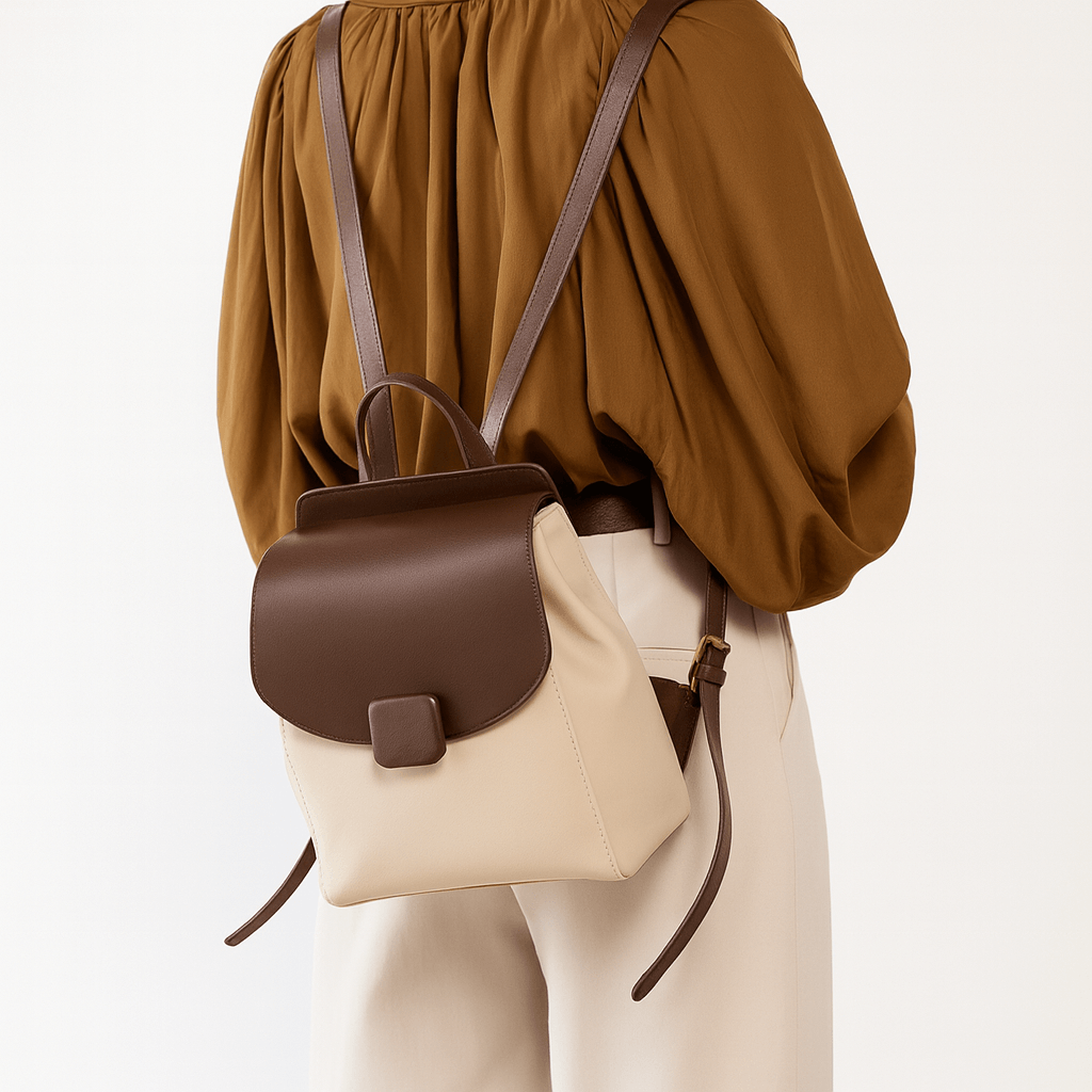 Mini Backpack for Women - Two-Tone Leather worn by a model, showcasing its stylish design and practicality.
