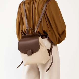 Mini Backpack for Women - Two-Tone Leather worn by a model, showcasing its stylish design and practicality.