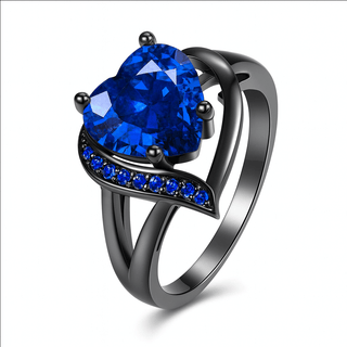 Fashion Couple Rings Stainless Steel featuring a heart-shaped blue gemstone and elegant design.