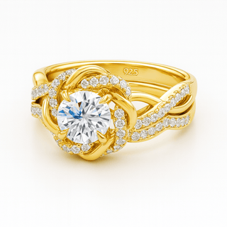 Gold ring with a large diamond and smaller diamonds on a white background