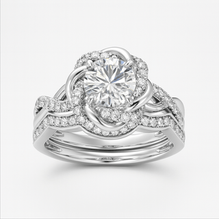 Silver ring with a large central gemstone and smaller stones on a white background