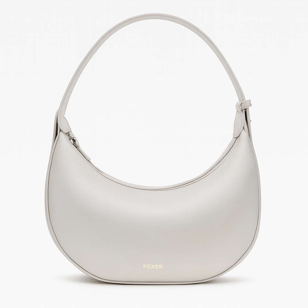 Stylish Half Moon Bag with zipper closure for women, featuring soft PU material and solid pattern.