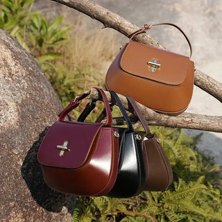 Shoulder Bag Leather - Fashion, elegant saddle bags in brown, burgundy, black, and dark brown with decorative lock.