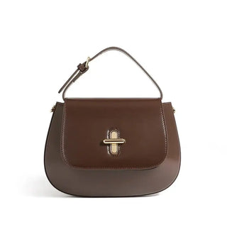 Shoulder Bag Leather - Fashion, brown leather saddle bag with decorative lock and comfortable handle.