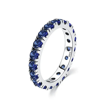Classic Round Zircon Ring 925 Sterling Silver with blue zircon stones in a polished prong setting.