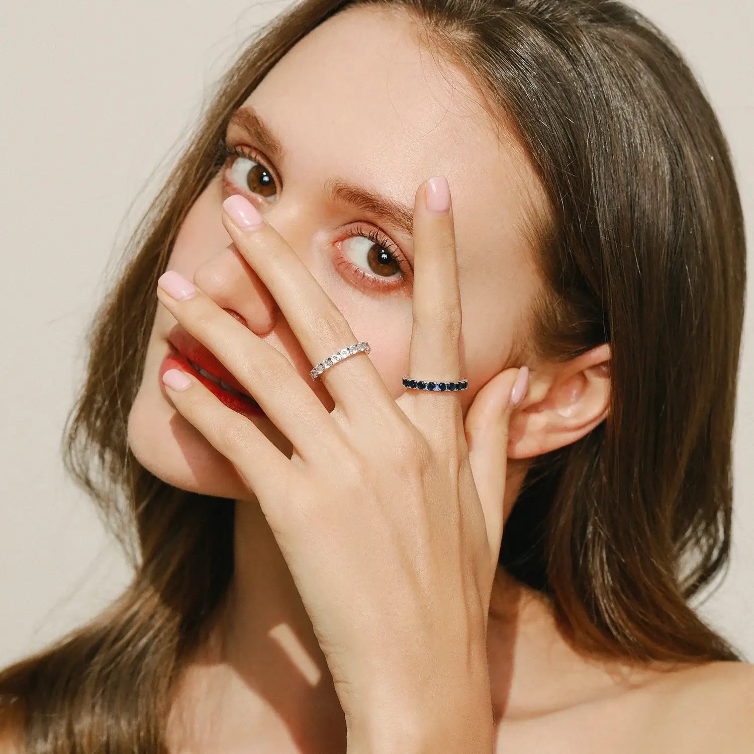 Model showcasing Classic Round Zircon Ring 925 Sterling Silver on her finger, elegant and sparkling with a refined design.