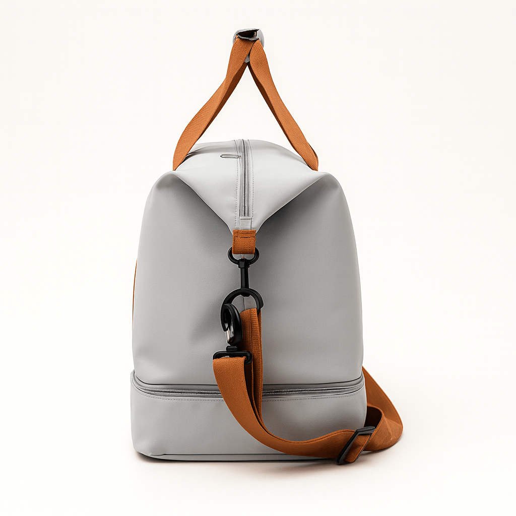 Gym Bag with Shoe Compartment in gray with brown accents, ideal for gym and travel.