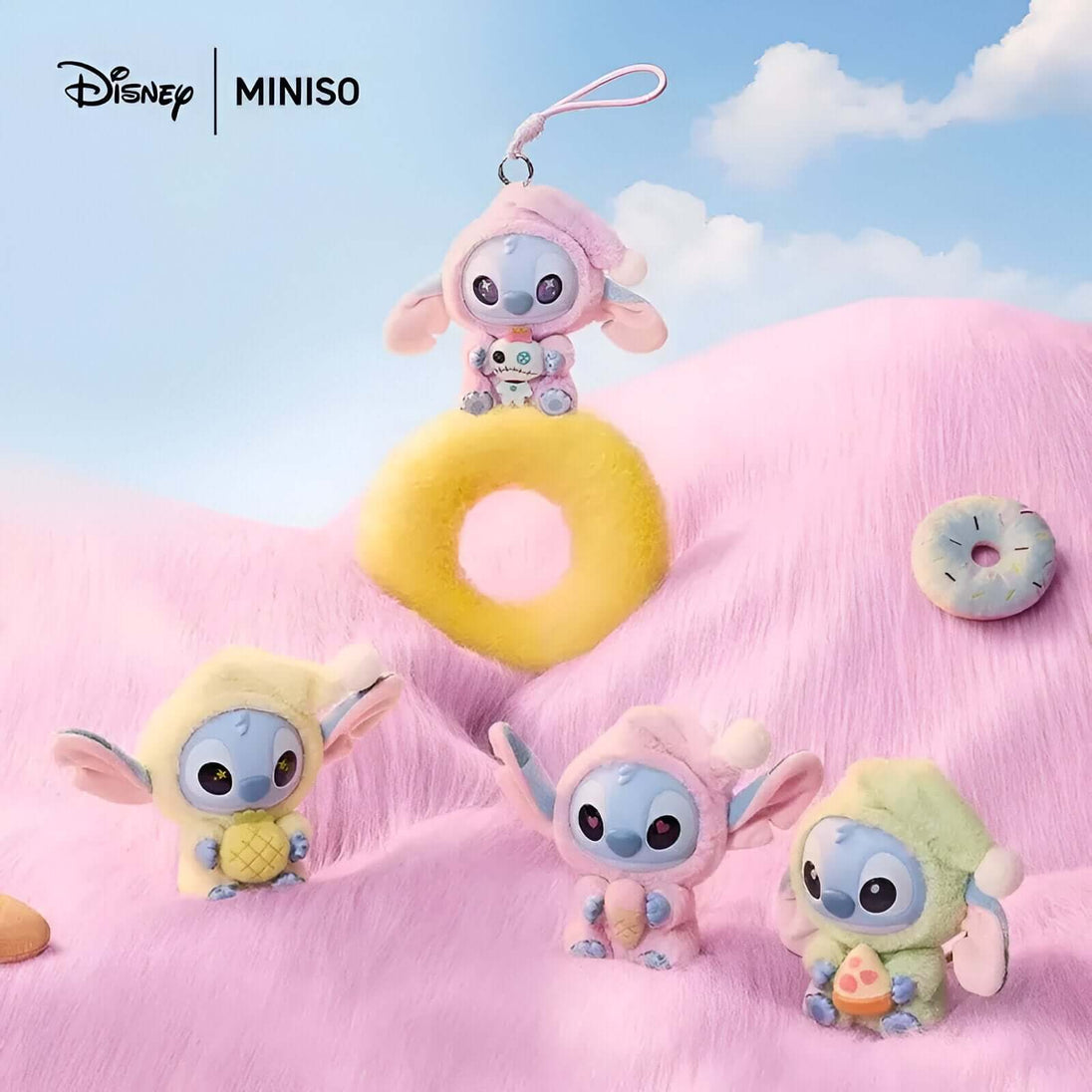 Disney Lilo Stitch plush toys in pastel colors, featuring collectible figures on a pink backdrop.