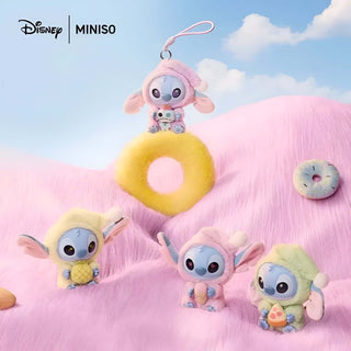 Disney Lilo Stitch plush toys in pastel colors, featuring collectible figures on a pink backdrop.
