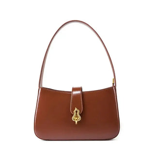 Brown leather shoulder bag with zipper closure and decorative lock, sophisticated and versatile for any occasion.