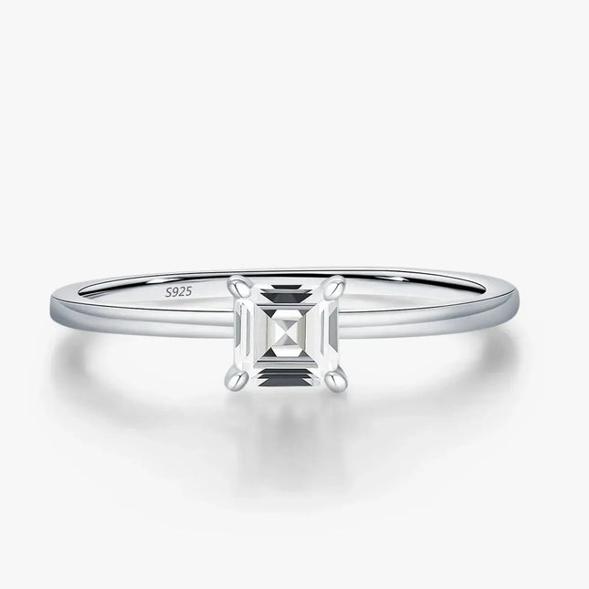 Emerald Cut Moissanite Ring on a sleek 925 sterling silver band with a brilliant square moissanite centerpiece.