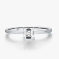 Emerald Cut Moissanite Ring on a sleek 925 sterling silver band with a brilliant square moissanite centerpiece.