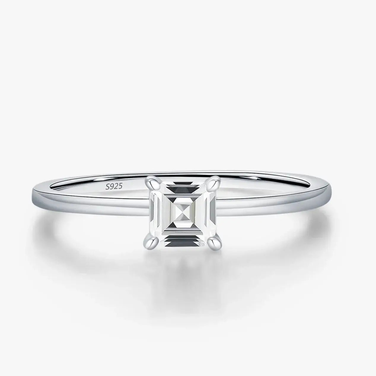 Emerald Cut Moissanite Ring on a sleek 925 sterling silver band with a brilliant square moissanite centerpiece.