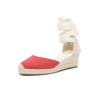 Red women's espadrillas sandals with ankle strap and stylish lace-up design for casual comfort.