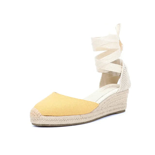 Espadrillas sandals in yellow and beige, women's ankle strap wedges with lace-up design for a stylish casual look.
