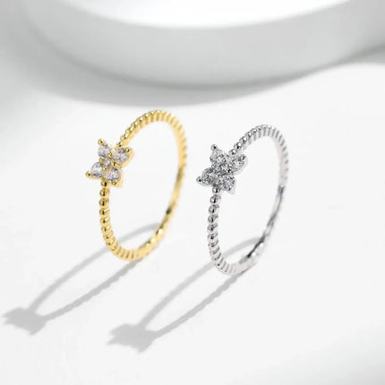Four Leaf Clover Moissanite Ring 925 Sterling Silver displayed in gold and silver variations.