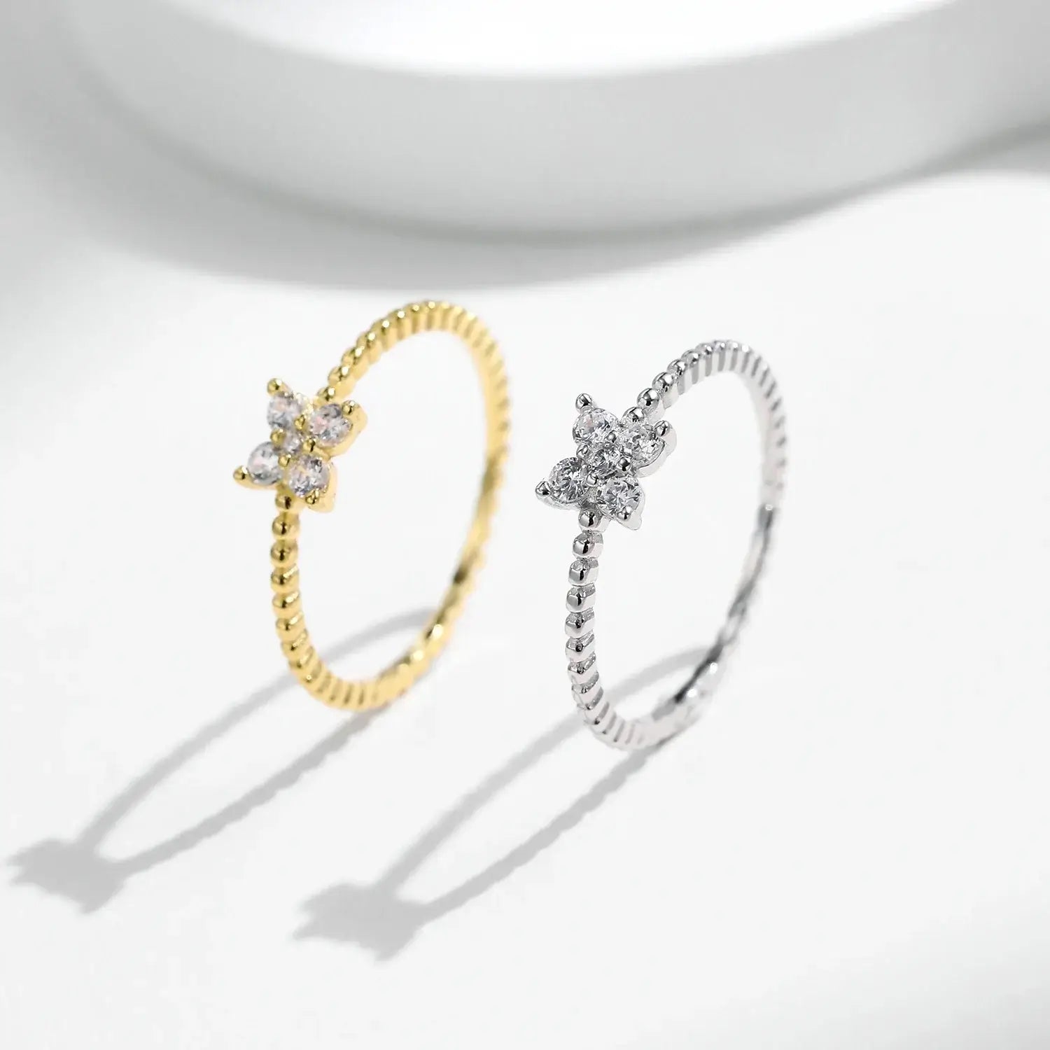 Four Leaf Clover Moissanite Ring 925 Sterling Silver displayed in gold and silver variations.