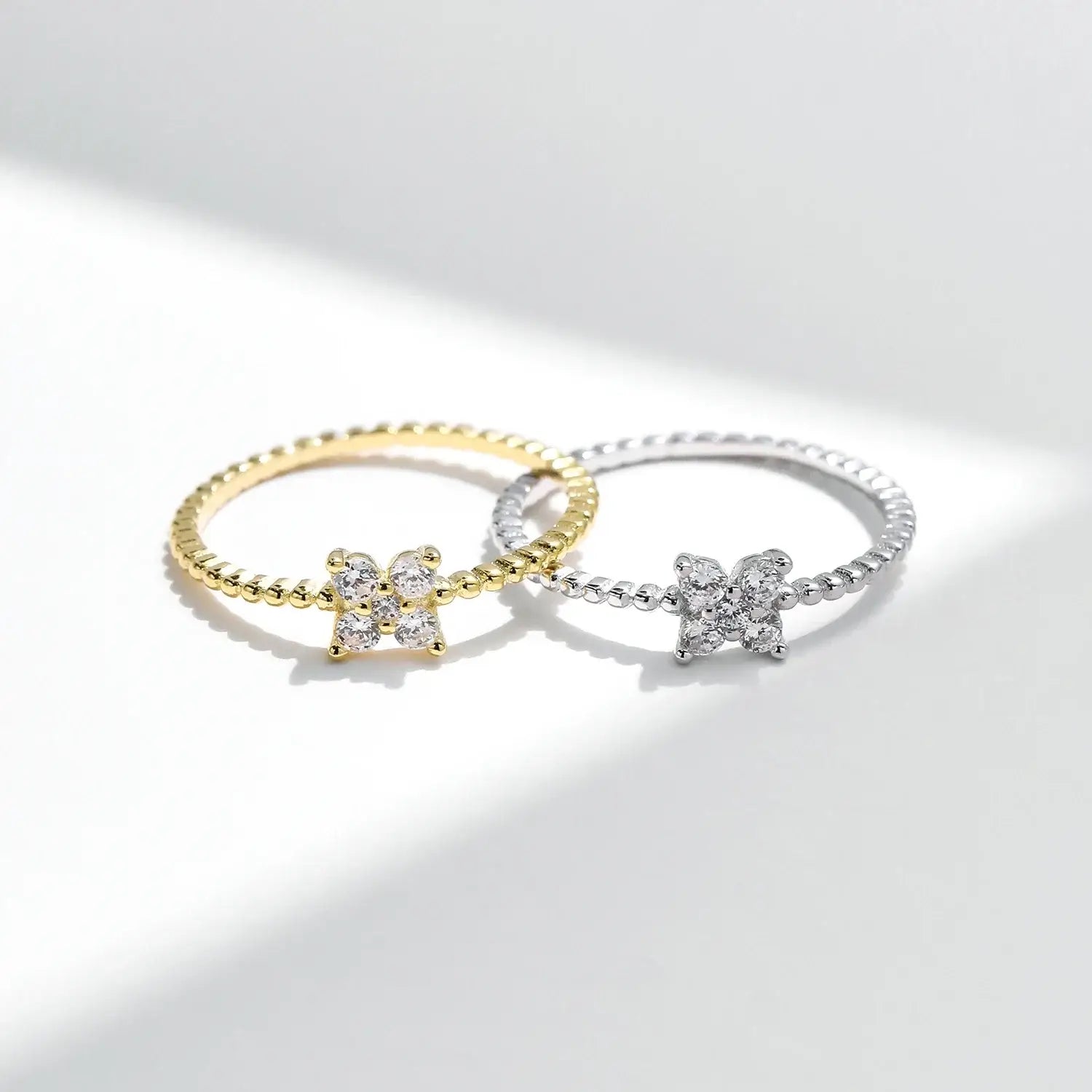 Four Leaf Clover Moissanite Ring 925 Sterling Silver - Elegant design with shimmering stones in yellow and silver.