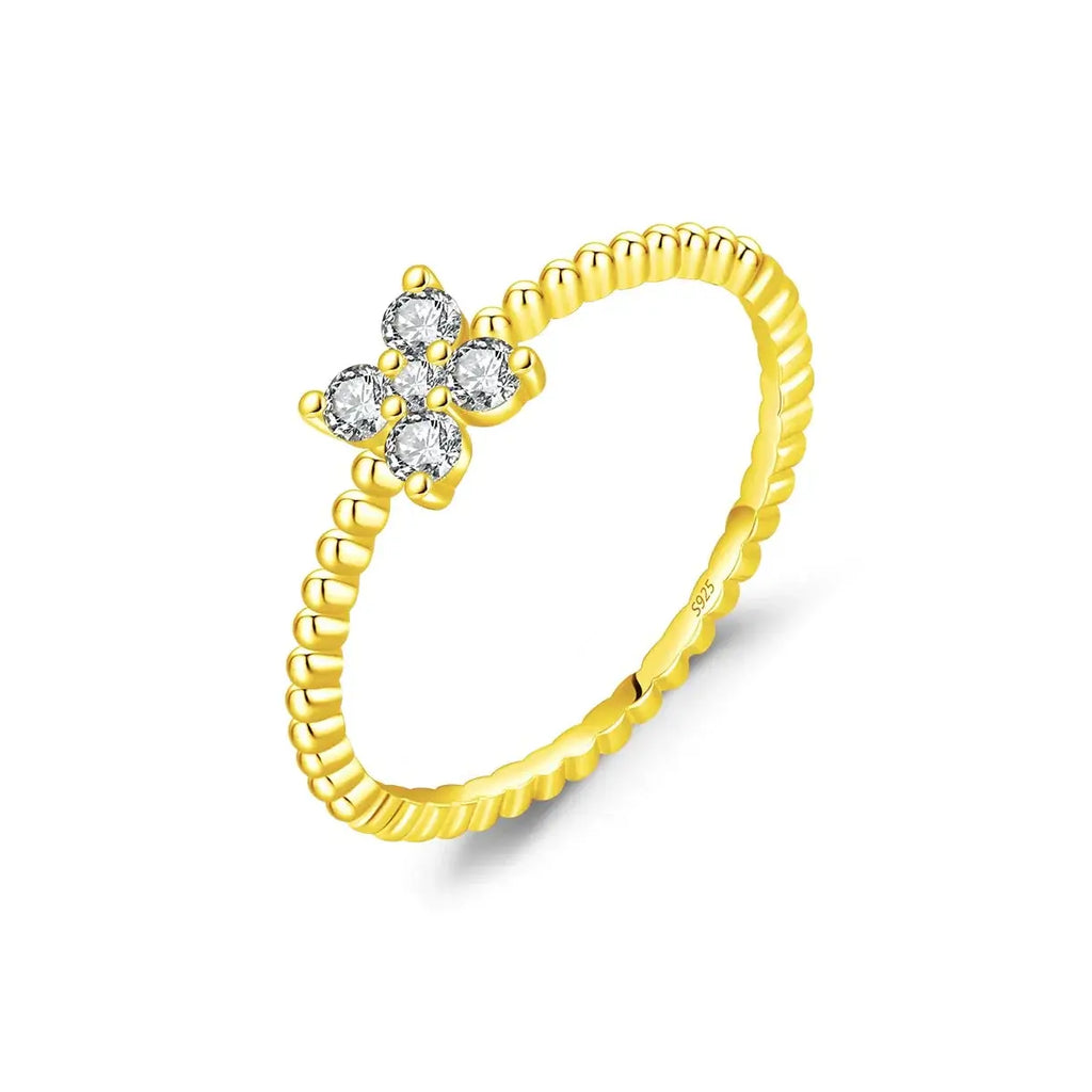 Four Leaf Clover Moissanite Ring 925 Sterling Silver in yellow gold with sparkling stones.