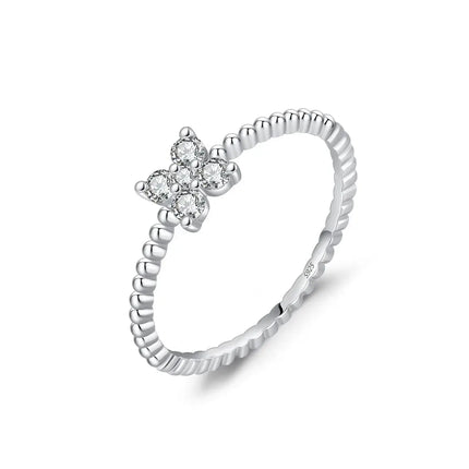 Four Leaf Clover Moissanite Ring 925 Sterling Silver showcased with delicate prong-set design and moissanite stones.