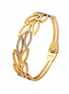 Gold bracelet with leaf-like design on a white background