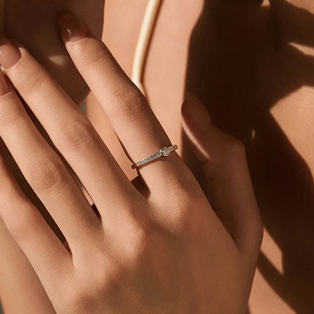 Geometric Bezel Moissanite Ring 925 Sterling Silver shown on hand, featuring a D-color VVS1 round stone and modern design.