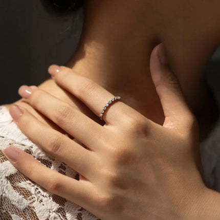 Geometric Moissanite Wedding Band Ring 925 Sterling Silver worn on a hand showcasing its elegant design and sparkle.