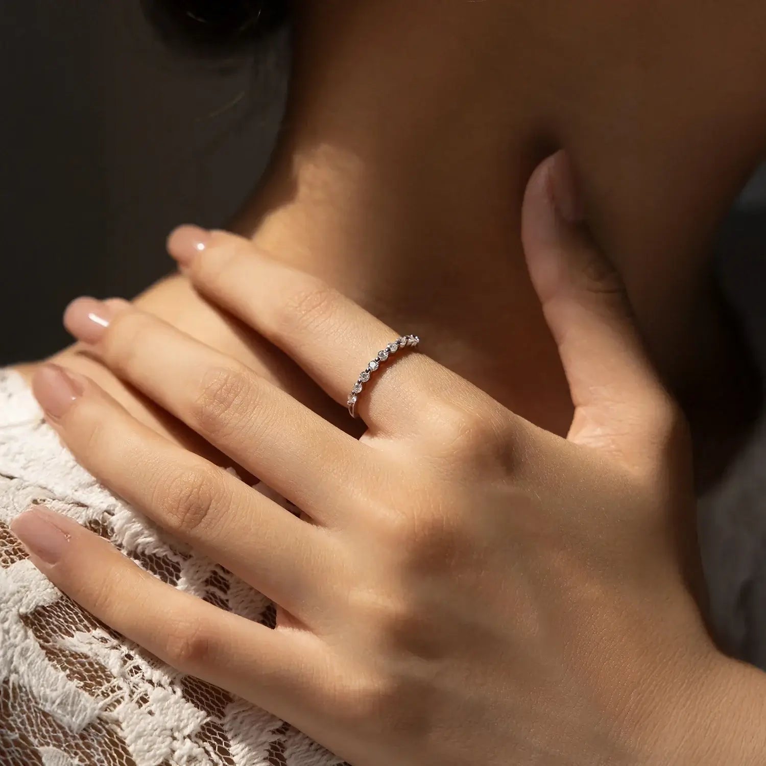 Geometric Moissanite Wedding Band Ring 925 Sterling Silver worn on a hand showcasing its elegant design and sparkle.