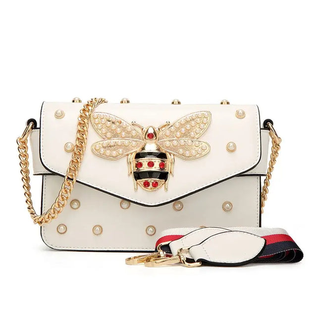Crossbody Bag with decorative bee and rivets, stylish design, suitable for women, versatile use.