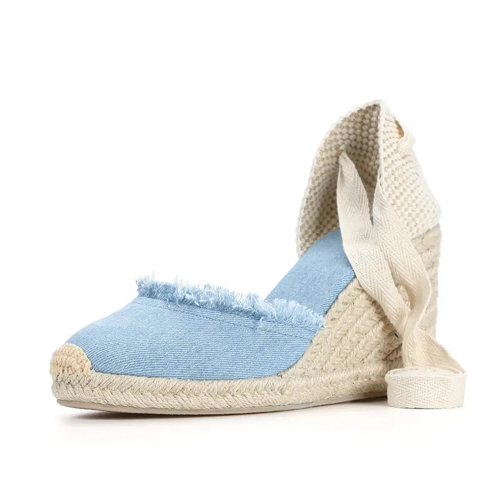 Women's Denim Espadrilles in light blue with ankle strap and wedge heel design, perfect for casual occasions.