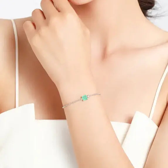 Bracelet 925 Sterling Silver worn on wrist showcasing Paraiba tourmaline in modern geometric design.