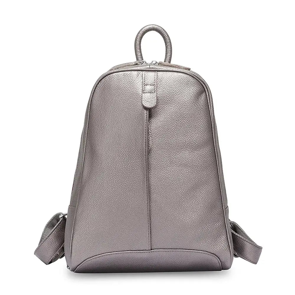 Lightweight silver handmade genuine leather backpack, stylish and practical for women, unmatched durability and comfort.