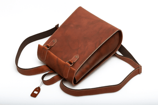 Handmade genuine leather backpack in brown, softback style, perfect for work, travel, and everyday use.