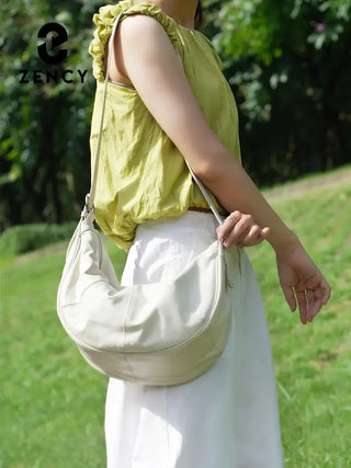 Handmade women's hobo shoulder bag in cream leather, stylish and lightweight for everyday use.