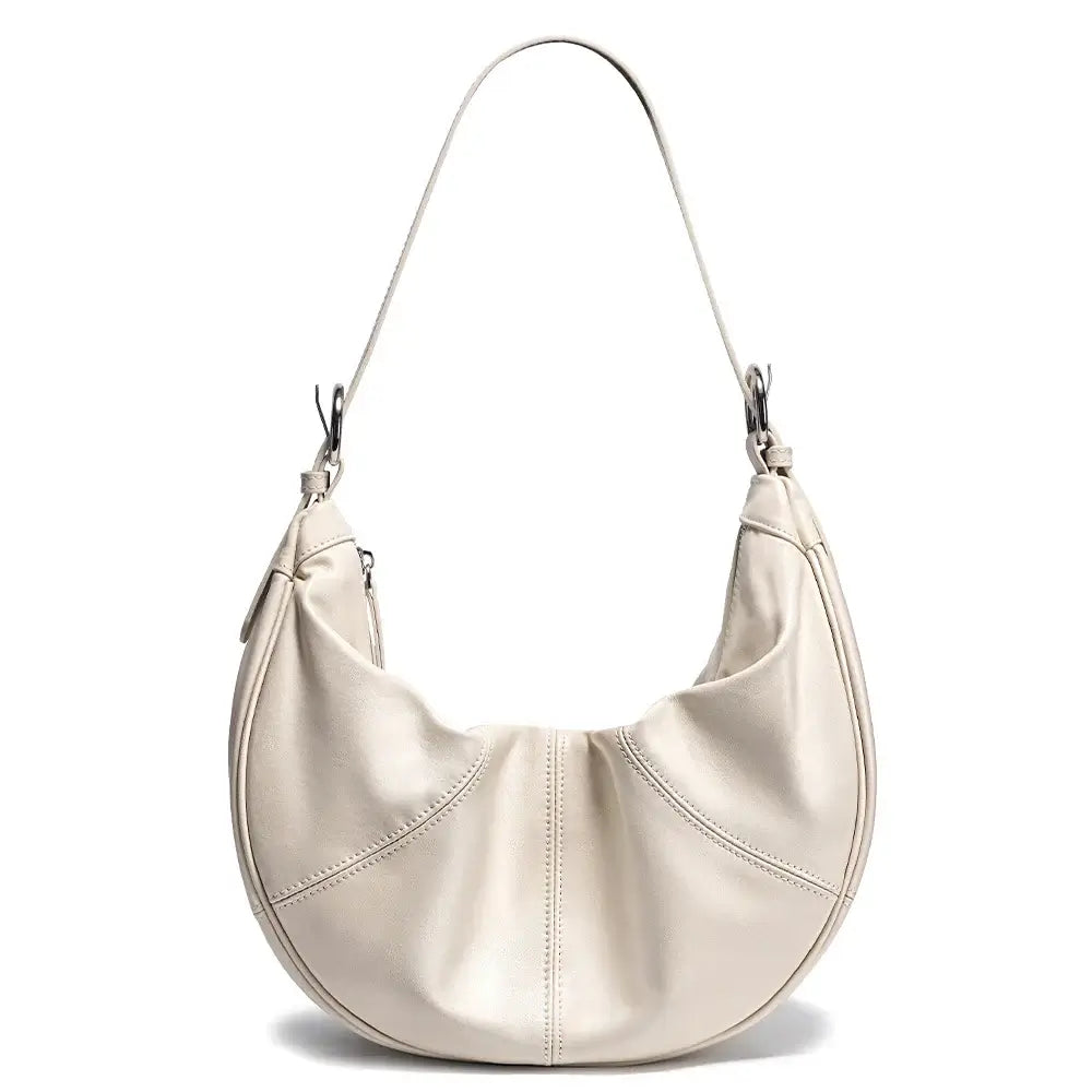 Handmade women’s hobo shoulder bag in soft cream genuine leather, stylish and spacious for everyday use.