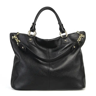 Handmade genuine leather black tote bag with spacious silhouette and stylish design.