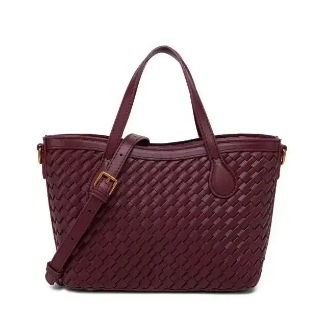 Handmade woven tote bag in burgundy color, featuring zipper closure and adjustable strap for stylish everyday use.