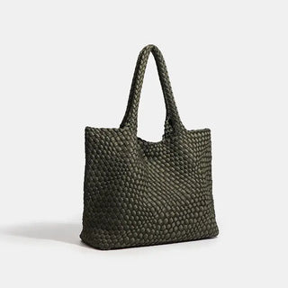 Woven shoulder bag in dark green, stylish tote with a textured design, perfect for everyday use.