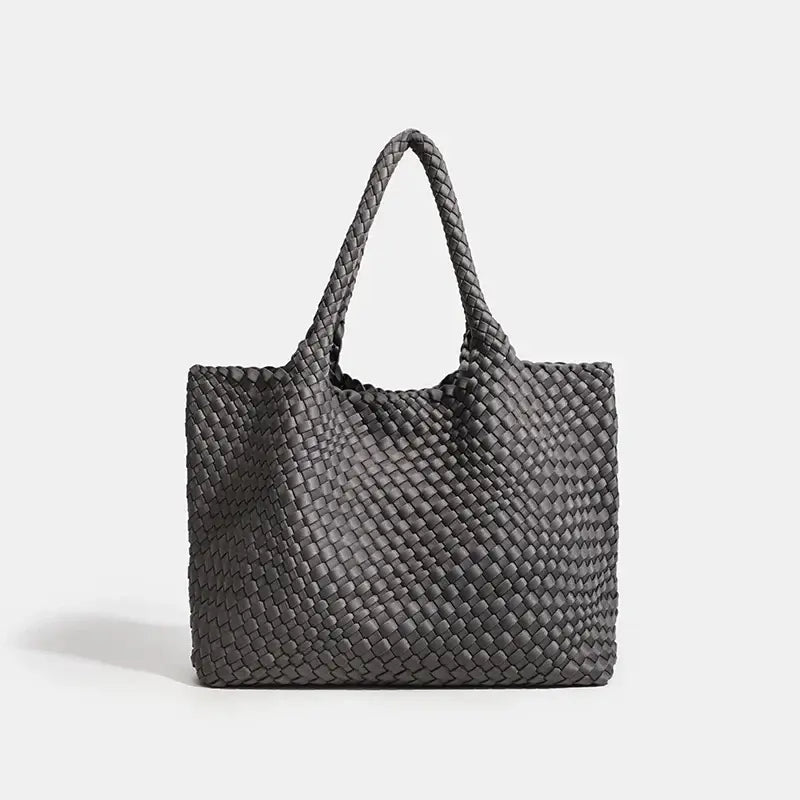 Woven shoulder bag in dark gray, featuring a stylish criss-cross design and practical tote style.