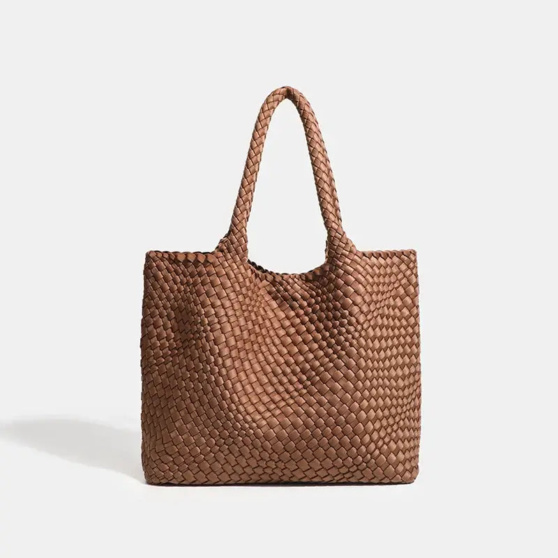 Woven shoulder bag in brown with a stylish design, featuring durable handles and a textured surface.