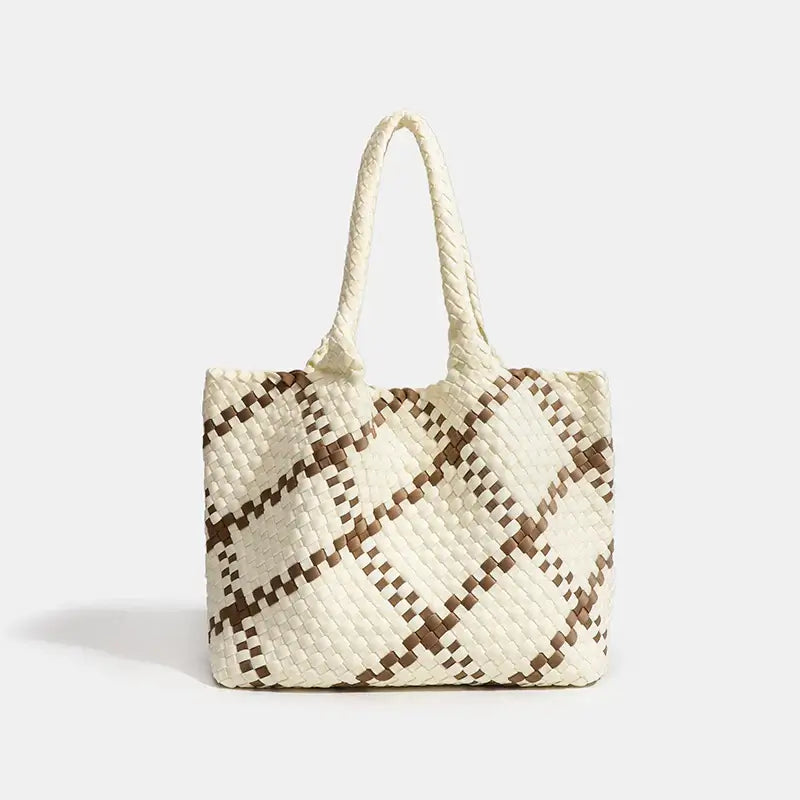 Woven shoulder bag in cream and brown with flap pocket, ideal for stylish everyday use.